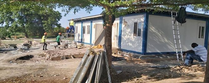Kefree — site works alongside a building under construction