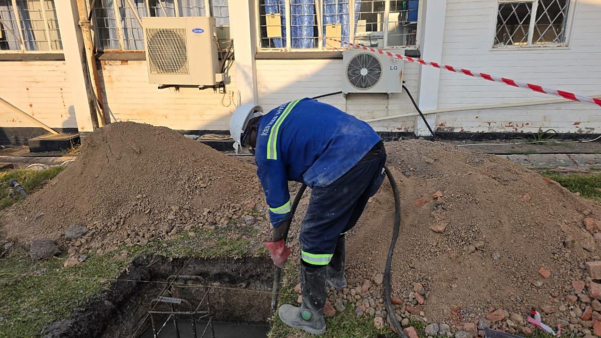 Kefree crew placing and finishing a concrete slab